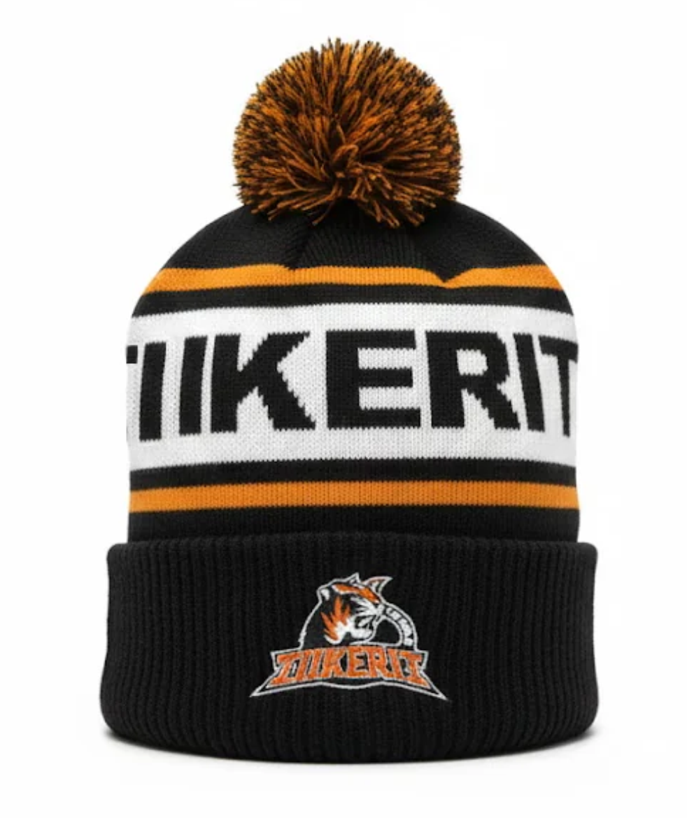 Tiikerit tupsupipo tekstillä